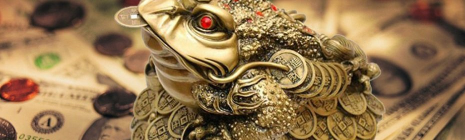 Ağızdakı bir sikkə ilə bir toad - pul cəlb etmək üçün bir talisman
