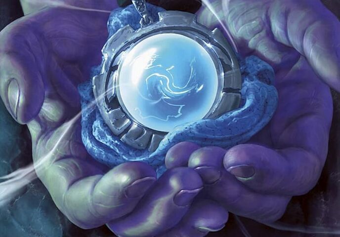əlində sehrli amulet və onu doldurmaq